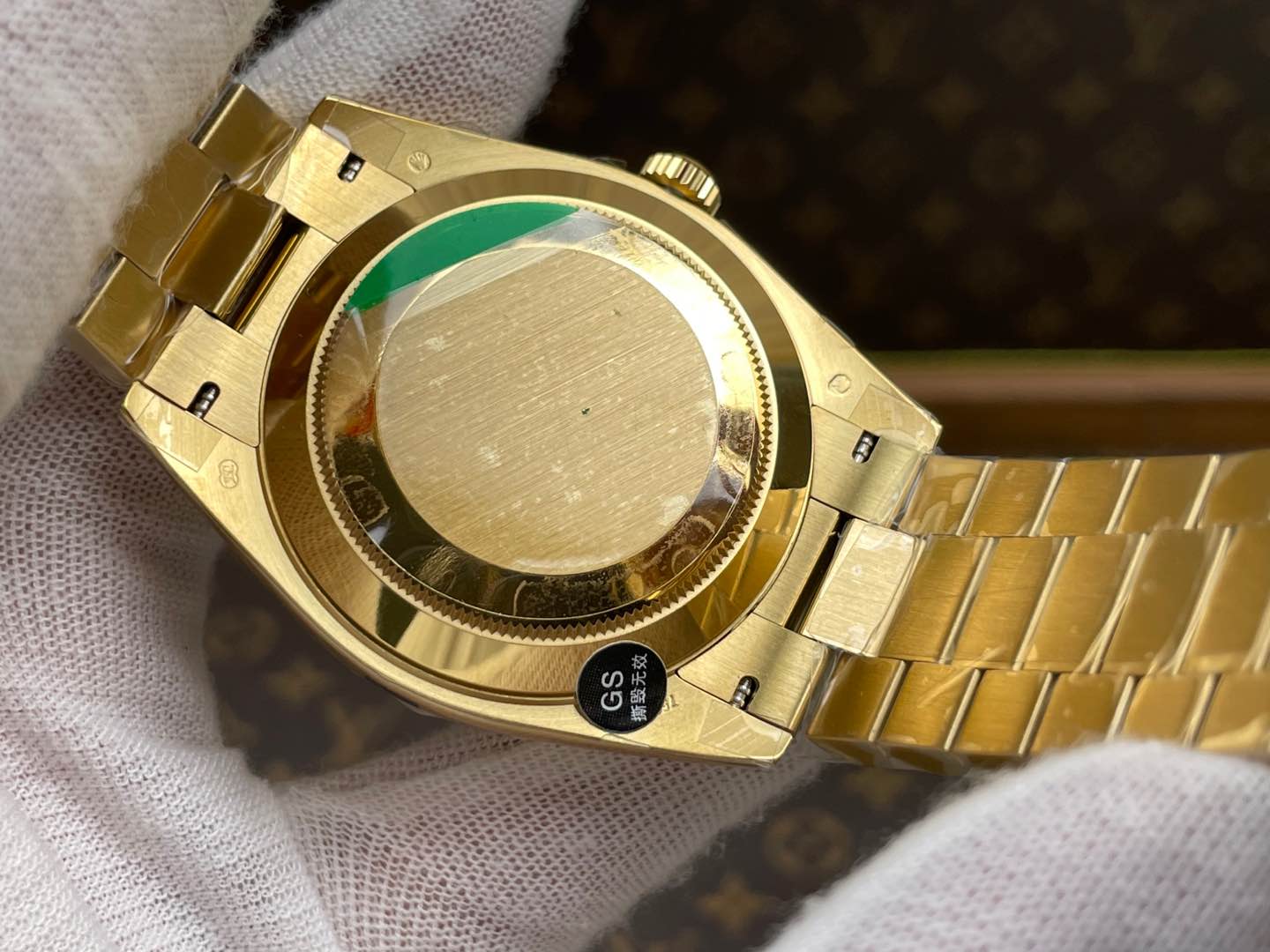 Rolex Day-Date 40, yellow gold, green dial