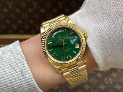 Rolex Day-Date 40, yellow gold, green dial