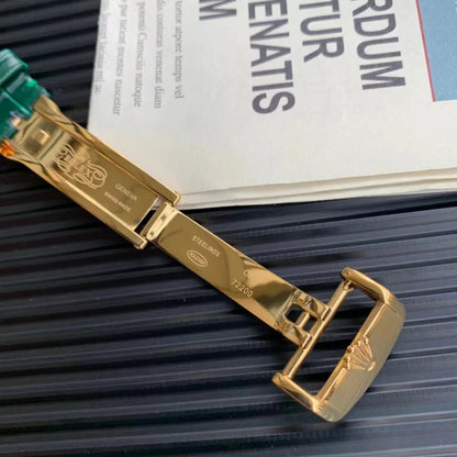 Rolex Day-Date, ref. 118138, yellow gold with green leather strap