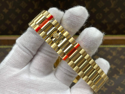 Rolex Day-Date 40, yellow gold, green dial