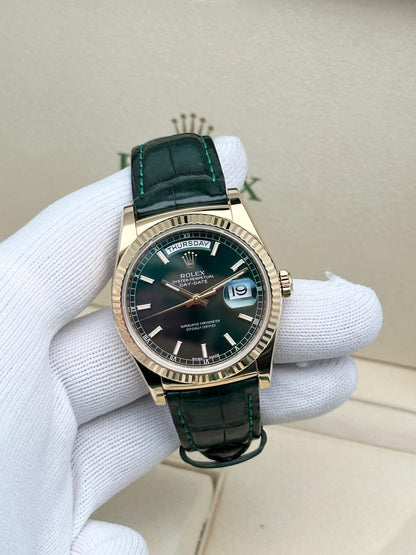 Rolex Day-Date, yellow gold with green leather strap
