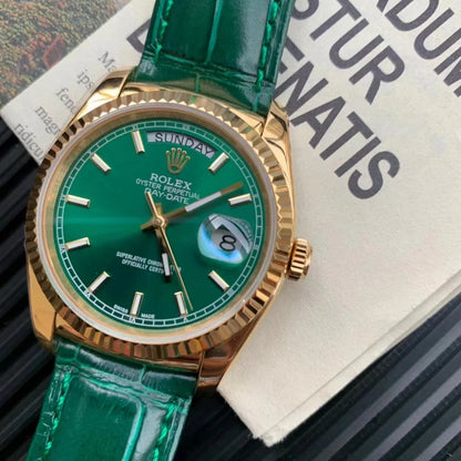 Rolex Day-Date, ref. 118138, yellow gold with green leather strap