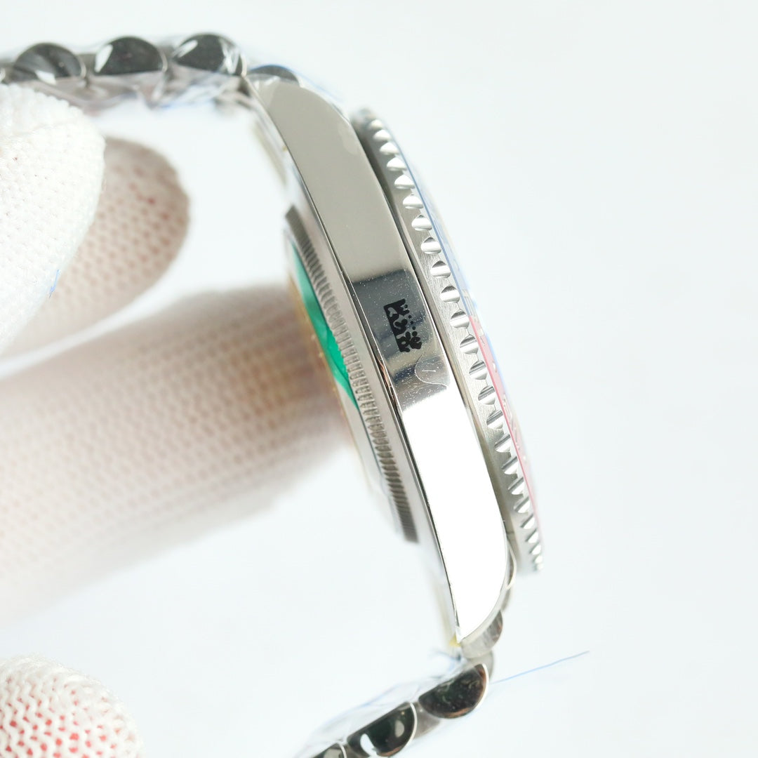 Rolex GMT-Master II, red & black bezel (“Coke” style)