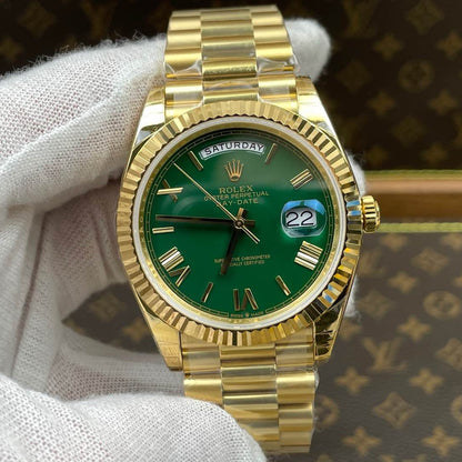 Rolex Day-Date 40, yellow gold, green dial
