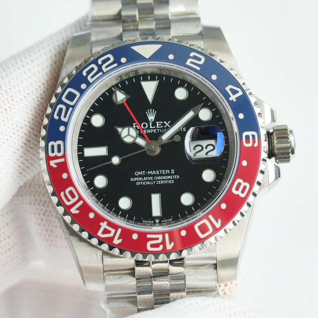Rolex GMT-Master II, red & black bezel (“Coke” style)