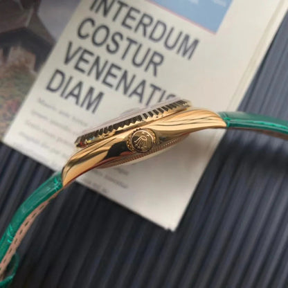 Rolex Day-Date, ref. 118138, yellow gold with green leather strap