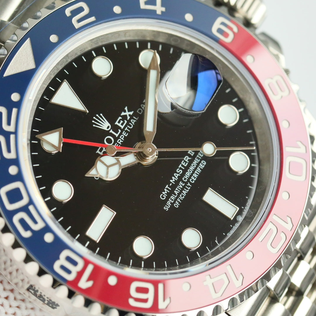 Rolex GMT-Master II, red & black bezel (“Coke” style)