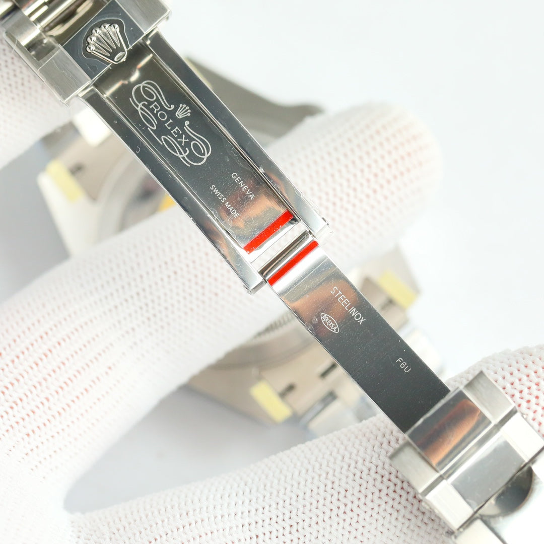 Rolex GMT-Master II, red & blue bezel (“Pepsi”)