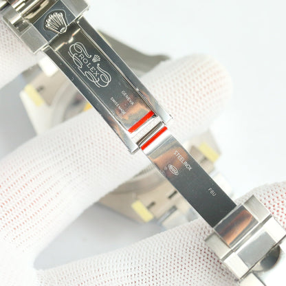 Rolex GMT-Master II, red & blue bezel (“Pepsi”)