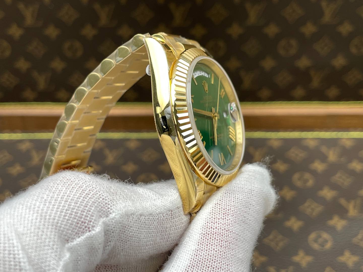 Rolex Day-Date 40, yellow gold, green dial