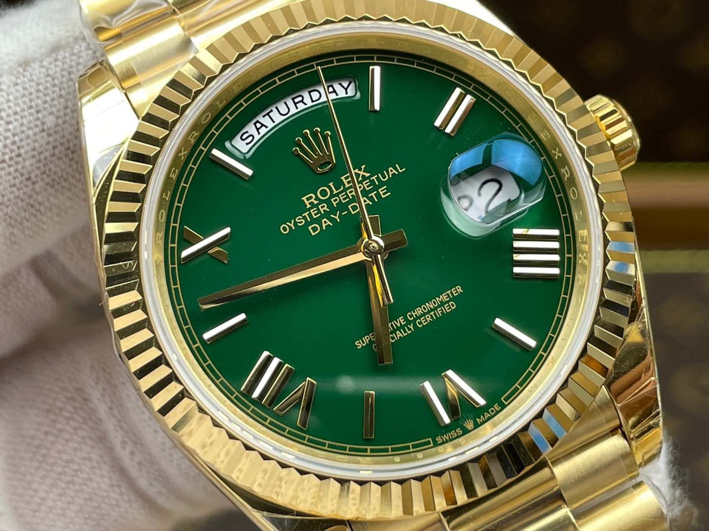 Rolex Day-Date 40, yellow gold, green dial