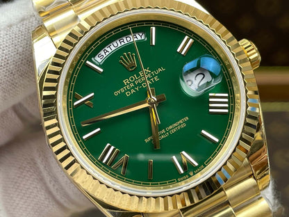 Rolex Day-Date 40, yellow gold, green dial