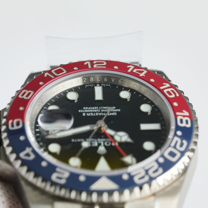 Rolex GMT-Master II, red & black bezel (“Coke” style)